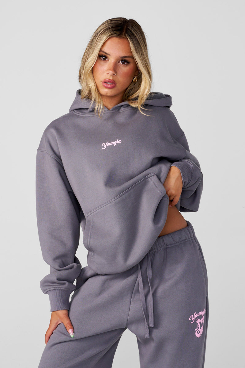W566 Soft Serve Hoodie for women with super soft, fluffy fleece and featuring a fun puff print in color Dusty Blue