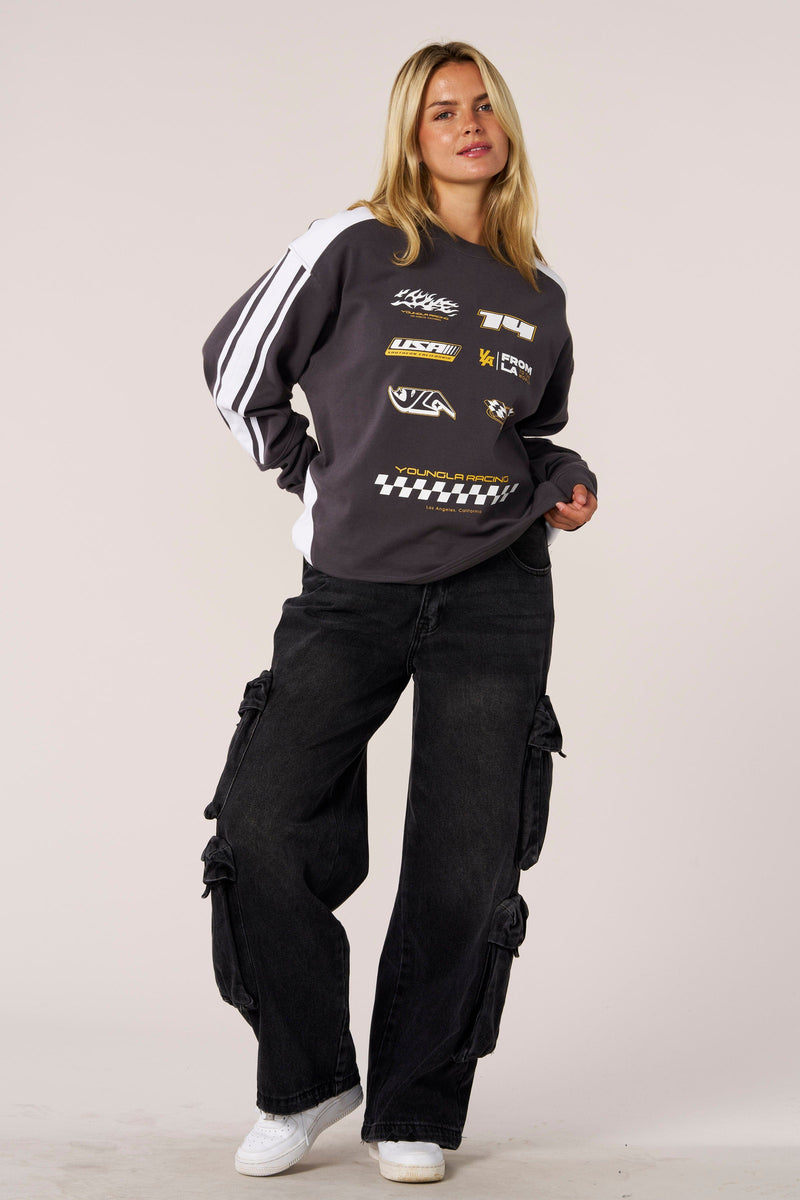 W4230 - Drift Jersey for women for transitional weather and bold, everyday style in color Charcoal.