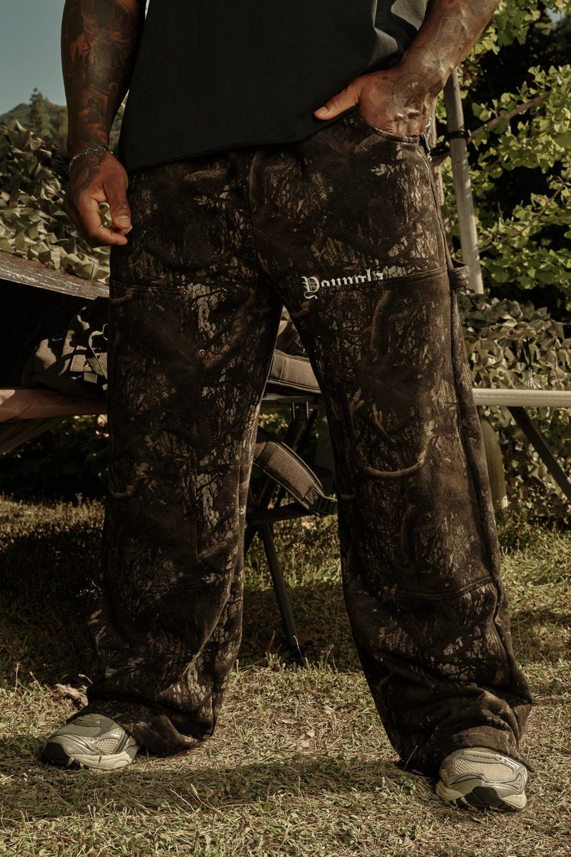 2055 - Carpenter Sweats for Men: 100% cotton heavyweight 460 GSM baggy sweats with workwear-inspired stitch lines, premium feel, and comfortable utility design in color Dark Tree Camo.