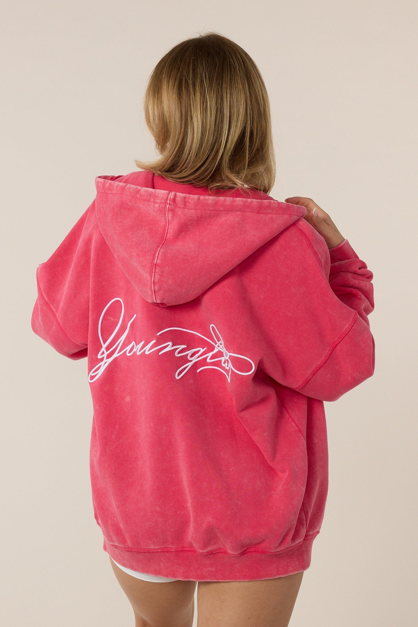 W533 Flashback Zip Hoodie  for women  with bold color blocking and an effortlessly oversized fit in color Hot Pink.