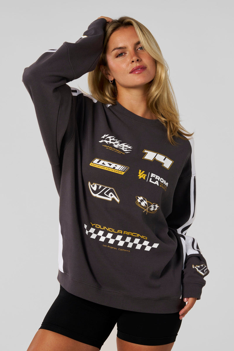 W4230 - Drift Jersey for women for transitional weather and bold, everyday style in color Charcoal.
