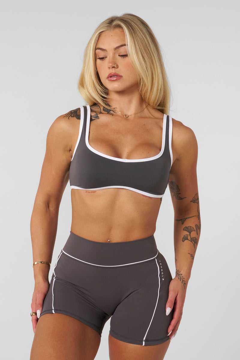 W366 - Elevate outline Bra
— soft, brushed fabric with a sweetheart neckline, removable pads, and a comfortable fit for lounging, light activity, or layering in Charcoal