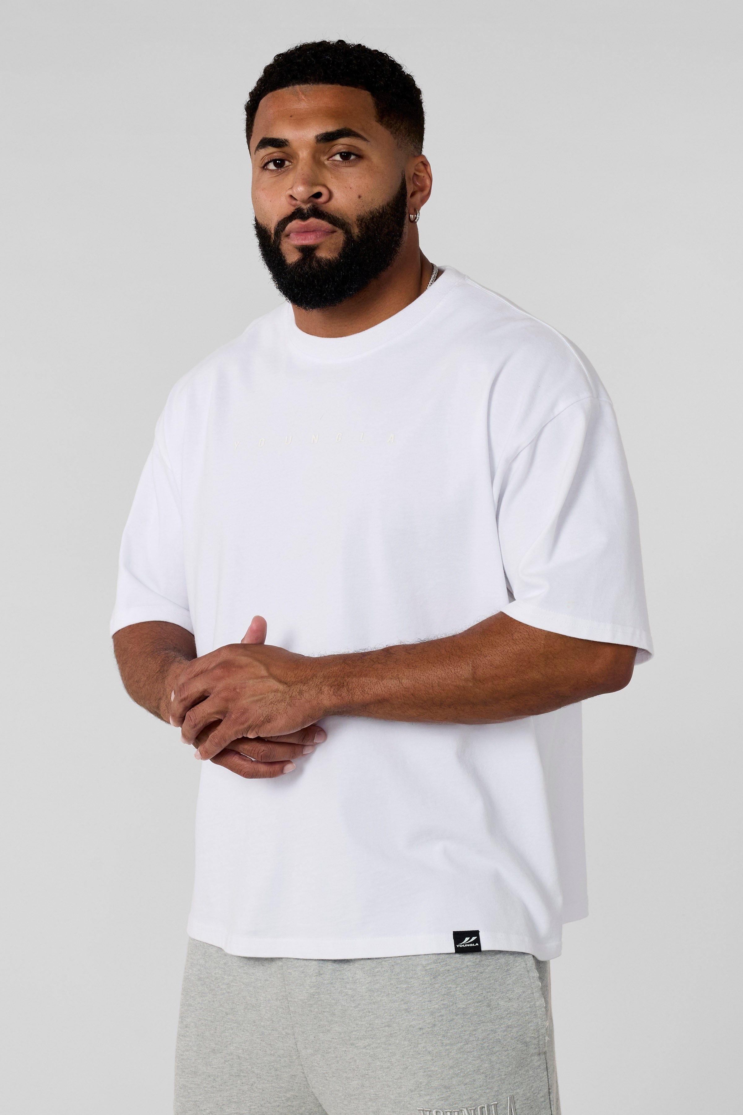 4219 - Summer Peached Tees for Men: 100% cotton garment-washed tee with buttery-soft hand feel, smooth drape, laid-back fit, and perfect for everyday layering in color White.